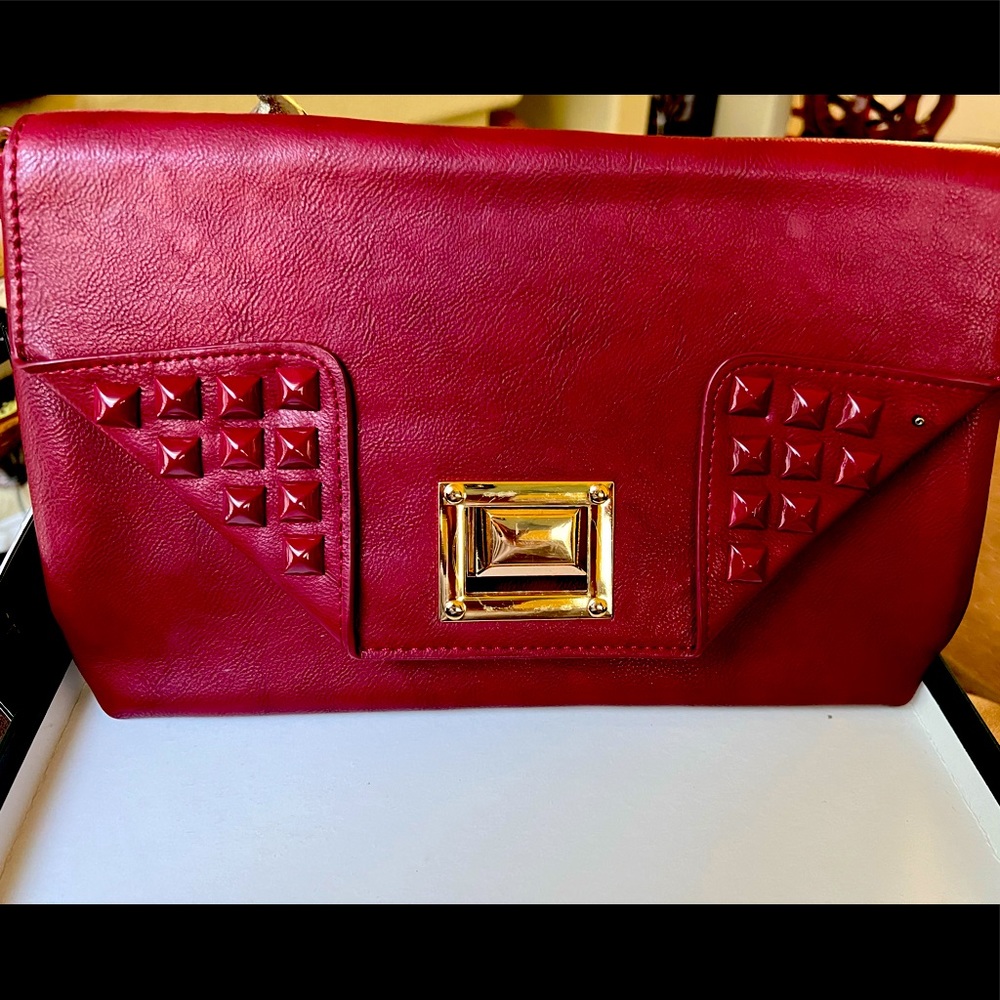 MMS DESIGN STUDIO TAG SAYS RED but it looks more berry maroon color.